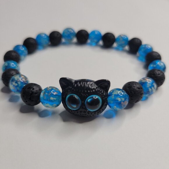 NWT Glow In The Dark Ladies Black & Blue Chinese Cat Lava Rock Stretch Bracelet - Picture 3 of 7